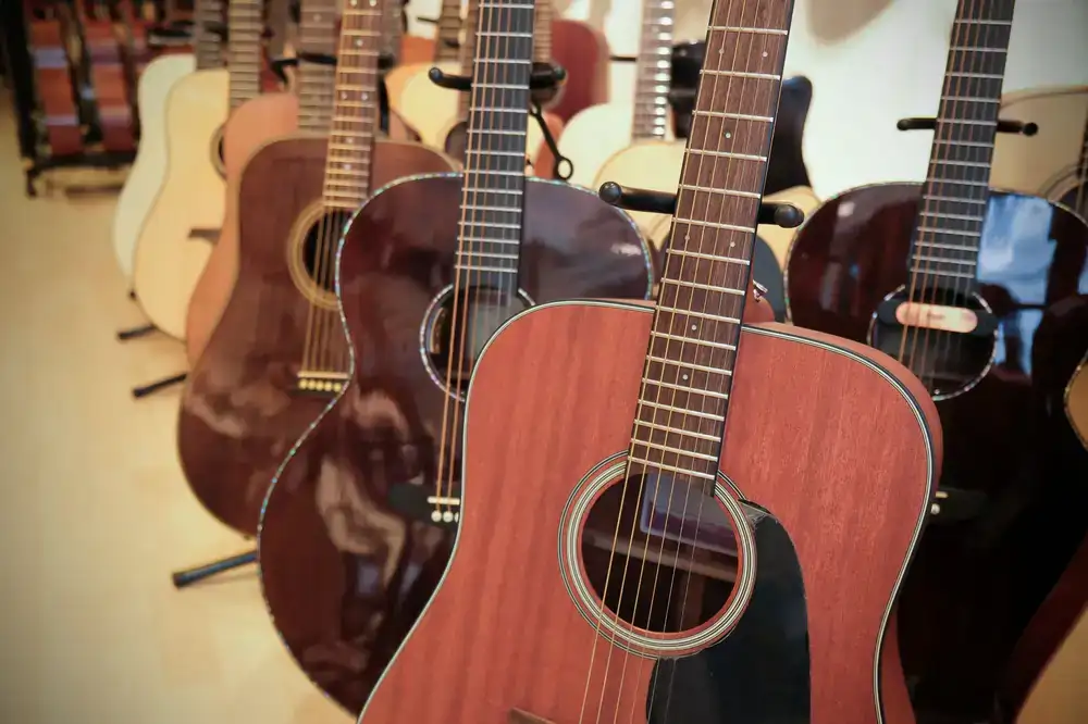 Row of beautiful acoustic guitars